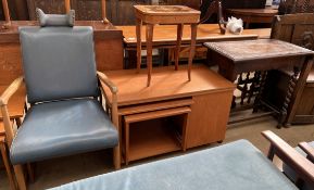 A 20th century oak occasional table together with a teak table and nest of tables combined,