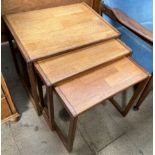 A nest of three teak tables, E.