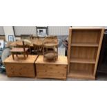 A pair of pine coffers together with a bookcase,