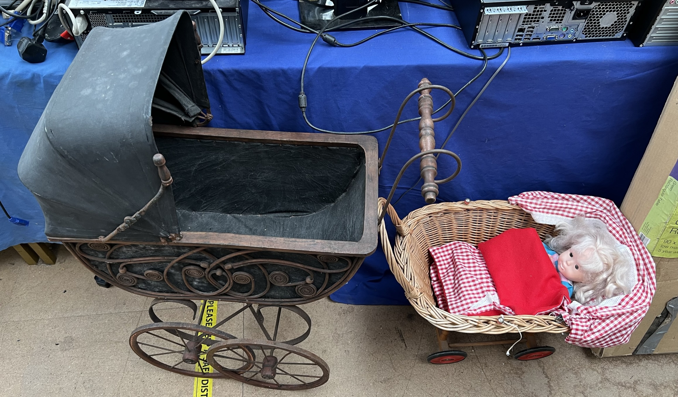 Two child's prams together with a doll etc ***TO BE RE-OFFERED IN A FUTURE SALE FOR ESTIMATES OF