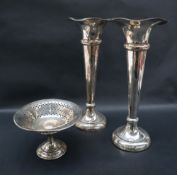 A pair of Edwardian silver flared vases with a tapering knopped column on a spreading foot, Chester,