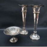 A pair of Edwardian silver flared vases with a tapering knopped column on a spreading foot, Chester,