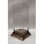 A millennium silver and glass vase of rectangular form on a square silver base, 2000,