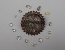 A silver brooch of circular form, pierced "Bessie",