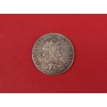 A Charles II silver Crown dated 1663,