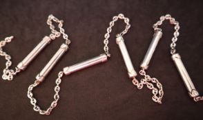 A continental white metal 800 standard necklace with oval links and cylindrical barrels, 86.