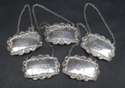 A matched set of five silver decanter labels for Brandy, Whisky, Port, Sherry and Gin, Birmingham,