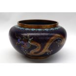 A Japanese cloisonne enamel vase of squat form decorated with dragons chasing a pearl to a Royal