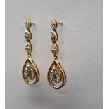 Gemporia - A pair of 18ct gold diamond set Tomas Rae earrings, totalling 1.