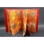 A set of twelve coins / tokens to commemorate the twelve emperors from Nurhaci to Xuantong,