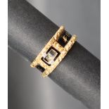 A 19th century 18ct gold Momento Mori ring with black enamel band "IN MEMORY OF" and panel for lock