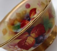 A Royal Worcester porcelain bowl painted to the centre with blackberries and leaves signed for,