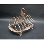 Of military interest - A George III silver six division toast rack,