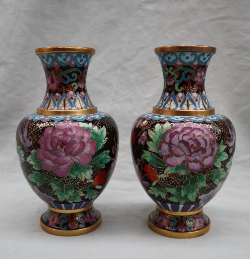 A pair of Japanese cloisonne enamel decorated vases decorated with birds and flowers, 18.