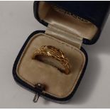 A Victorian yellow metal fede and triple hoop gimmel clasped hands and hearts betrothal ring hinged