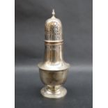 A George V silver sugar caster with a turned finial and a domed cover with a ring turned baluster