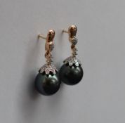 Gemporia - A pair of 18ct gold Tahitian cultured pearl and diamond earrings,