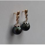 Gemporia - A pair of 18ct gold Tahitian cultured pearl and diamond earrings,