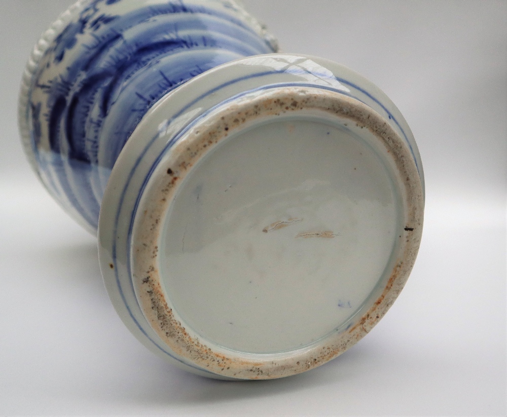 A Japanese blue and white porcelain vase decorated with a raised dragon encircling the vase further - Image 4 of 6