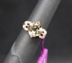 Gemporia - An 18ct gold Csarite and diamond Lorique ring, with an cushion 4.