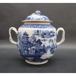 A Chinese porcelain twin handled vase and cover decorated with landscape scenes,