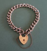 A 9ct yellow gold bracelet, with twisted oval links and a padlock clasp, approximately 28 grams,
