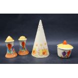 A Clarice Cliff pottery crocus pattern cruet comprising a mustard pot and cover,