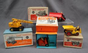 Dinky Supertoys - No 561 Blaw Knox Bulldozer, together with No 562 Dumper Truck,