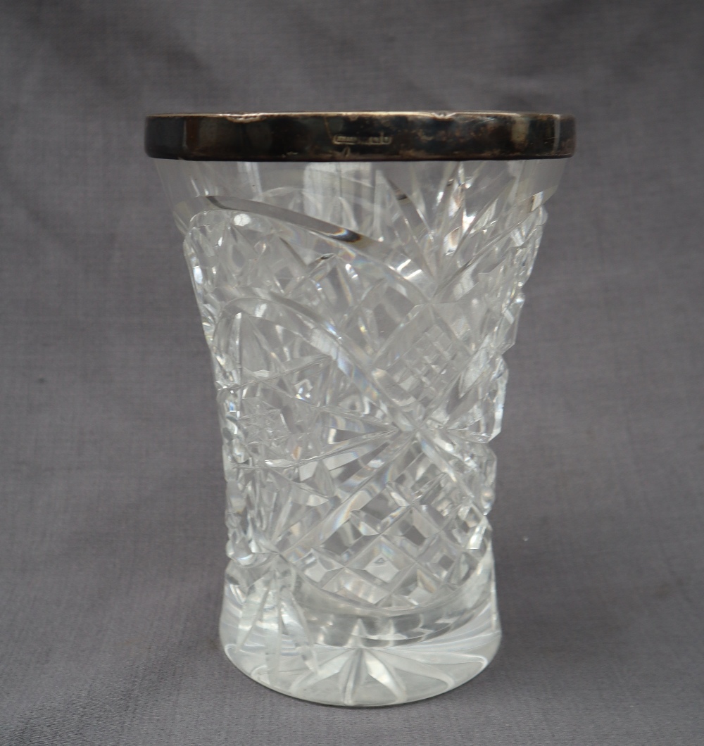 A Silver topped and cut glass vase, 18.