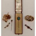 A 19th century yellow metal stick, turquoise set,