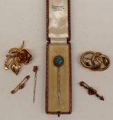 A 19th century yellow metal stick, turquoise set,