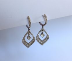 A pair of 18ct white gold diamond drop earrings set with round brilliant cut diamonds