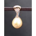 Gemporia - An 18ct gold Golden South Sea cultured pearl and diamond pendant,