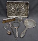 An Edward VIII silver rectangular dressing table tray decorated with flowers, leaves and scrolls,