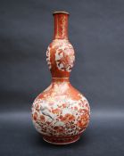 A Japanese kutani double gourd vase decorated with dragons,