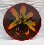 Poole pottery studio plate decorated with a "spider orchid", printed mark,