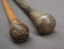 A Military Swagger Stick, the ball end applied with a Lion and "The King's Own",