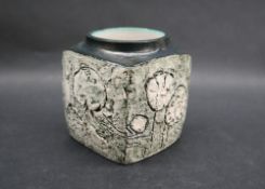 A Troika pottery vase of square form with a light green ground colour and incised geometric