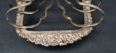 Of military interest - A George III silver six division toast rack,