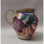 A Poole pottery jug, painted with large flowerheads and leaves, impressed and painted marks,