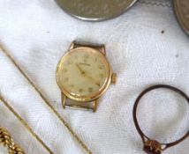 A lady's Omega wristwatch, with Arabic numerals together with a 9ct gold ring,
