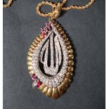 A diamond and ruby "Allah" pendant set with four round faceted rubies two pointed oval rubies and