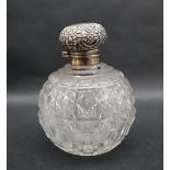 An Edward VII silver topped and cut glass scent bottle of globe form, Birmingham, 1904,