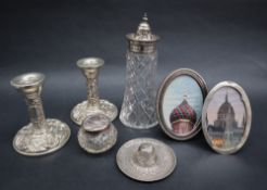 A pair of modern silver desk candlesticks embossed with birds, flowers and leaves, Birmingham, 2000,