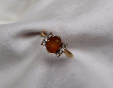 A citrine and diamond ring,