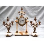 A 19th century French faux marble clock garniture,