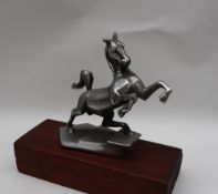 A chrome plated Humber Pullman car mascot, in the form of a rearing stallion,