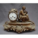 A 19th century ormolu mantle clock, depicting a seated maiden playing a lyre,