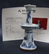 A Qianglong Qing Dynasty candlestick, with central drip tray, decorated with a dragon, 17.