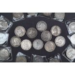 A George IIII silver Crown dated 1821, together with a collection of Crowns dated 1819, 1822, 1887,